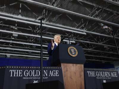 President Donald Trump speaks during a rally at Macomb Community College on April 29, 2025, in Warren, Michigan.