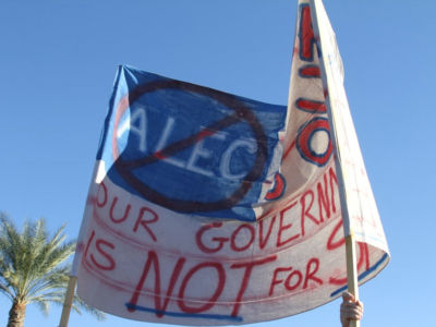 An anti-ALEC banner at a protest.
