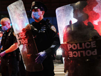 Police confront protesters in front of the Barclay's Center in Brooklyn on May 29, 2020, in New York City.