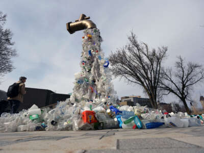 A sculpture titled Giant Plastic Tap by Canadian artist Benjamin Von Wong is displayed outside the fourth session of the UN Intergovernmental Negotiating Committee on Plastic Pollution in Ottawa, Canada, on April 23, 2024.