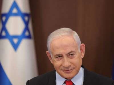 Israeli Prime Minister Benjamin Netanyahu attends the weekly cabinet meeting at his office in Jerusalem on September 27, 2023.