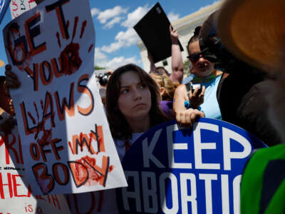 Abortion rights advocates participate in a protest outside of the Supreme Court Building on June 24, 2024, in Washington, D.C.
