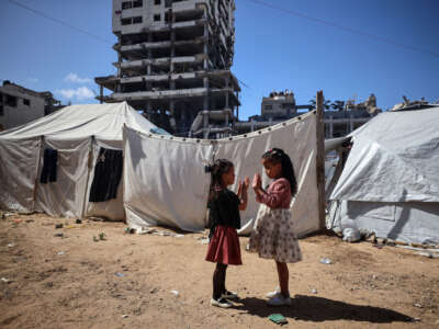 Palestinian children play in Gaza City, on March 30, 2025.