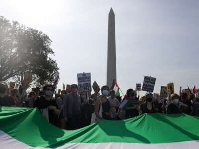 Thousands of Palestine supporters march for Gaza to the Immigration and Customs Enforcement (ICE) building in Washington, D.C. on April 5, 2025.