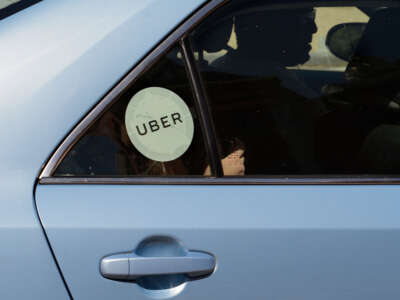 An Uber driver and car with passengers is pictured in Washington, D.C., on April 20, 2018.