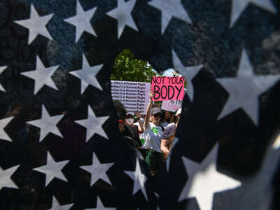 Abortion rights demonstrators attend a rally in front of the U.S. Supreme Court in Washington, D.C., on June 25, 2022.