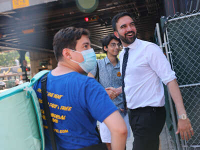 New York mayoral candidate and State Rep. Zohran Mamdani greets voters with Democratic mayoral candidate Michael Blake on 161st Street on June 24, 2025, in the South Bronx in New York City