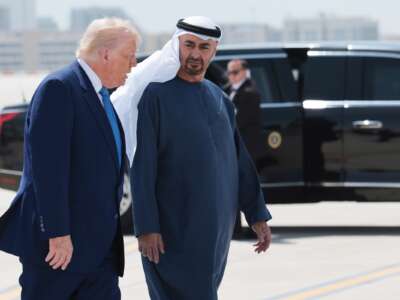 U.S. President Donald J. Trump talks to UAE President Sheikh Mohamed bin Zayed Al Nahyan as he departs the Al Bateen Executive Airport on May 15, 2025, in Abu Dhabi, United Arab Emirates.