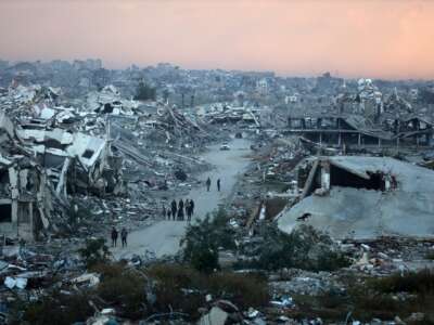 A general view shows destroyed houses in Nuseirat camp in the central Gaza Strip on December 26, 2025.