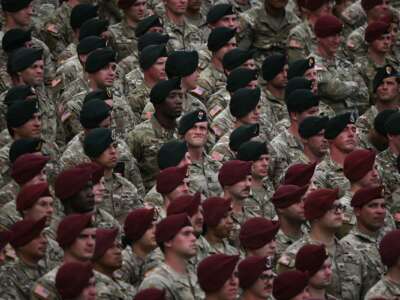 Members of the U.S. army listen as President Donald Trump speaks at Fort Bragg, a U.S. Army military installation, near Fayetteville, North Carolina, on June 10, 2025.