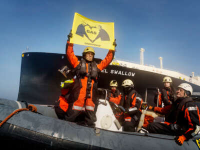 Greenpeace activists on board the Arctic Sunrise confront LNG fossil gas tankers from Russia and U.S. as part of a protest.