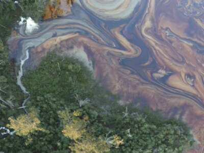 Oil and chemical slicks are seen in waterways near Roseland, Louisiana in the days after a Smitty’s Supply facility exploded in the town on August 22, 2025.