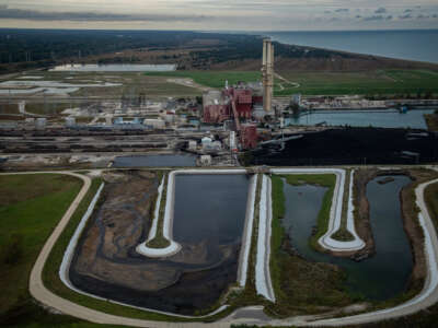 The two unlined ash ponds are seen in the foreground of the coal-fired NRG Waukegan Generating Station in Waukegan.