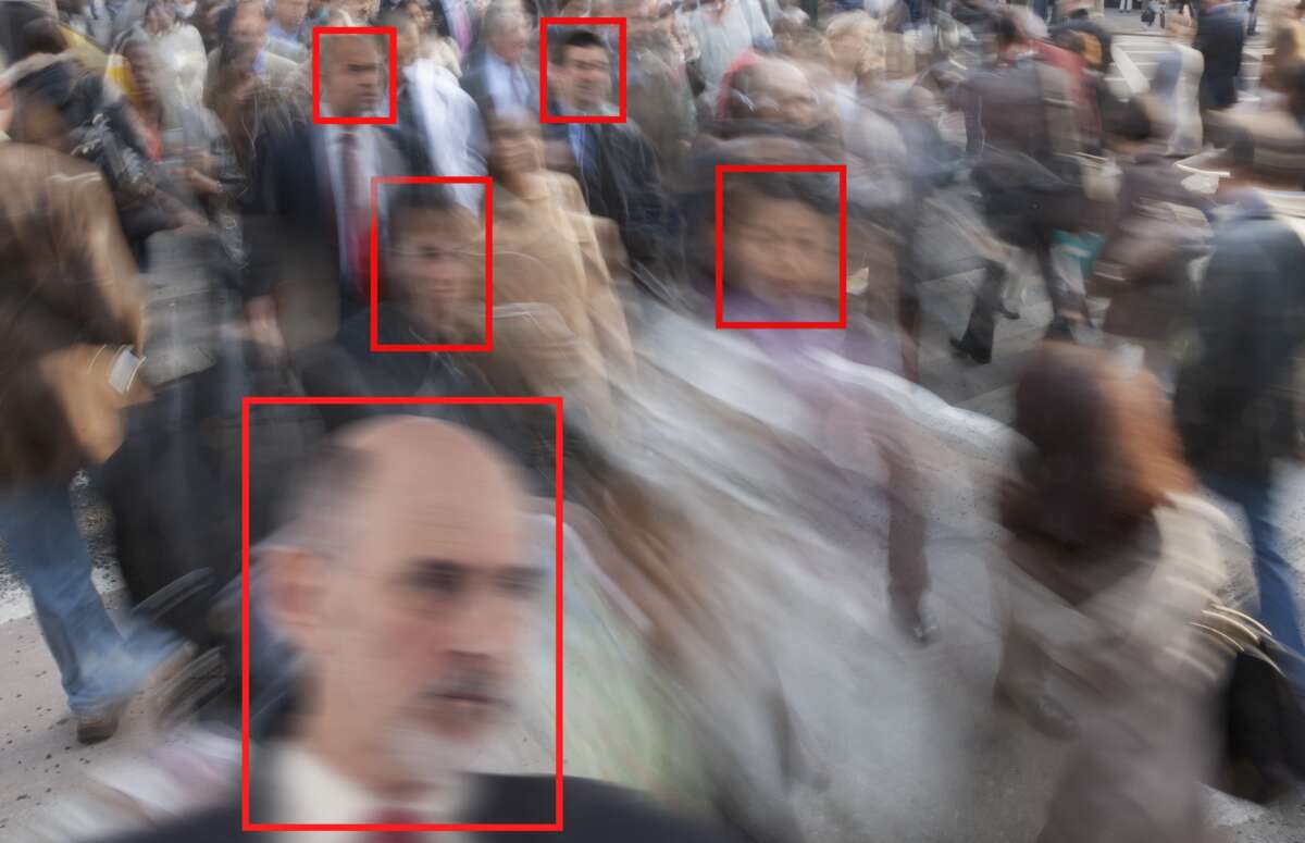 Facial recognition used on pedestrians in a crowd