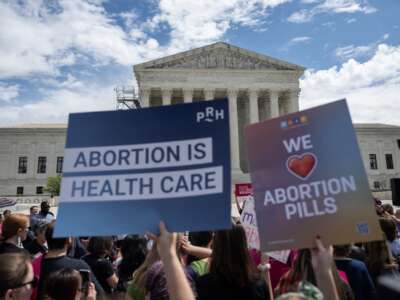 Demonstrators rally in support of abortion rights at the U.S. Supreme Court in Washington, D.C., on April 15, 2023, after the Supreme Court temporarily preserved access to mifepristone, a widely used abortion pill, in an 11th-hour ruling preventing lower court restrictions on the drug from coming into force.