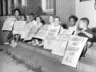 What conditions make it possible for people to enter into the lifelong and intergenerational work of unlearning racism? In this image, children rally in support of racially integrated schools in Malverne, New York, on August 2, 1962.