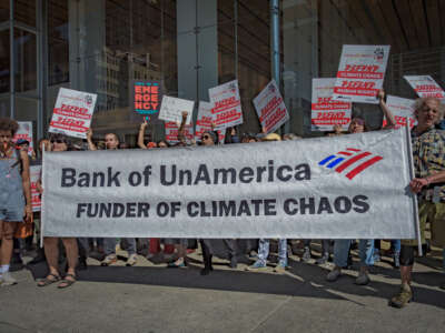 Climate activists rally outside Bank of America Tower in Midtown Manhattan as part of the March to End Fossil Fuels wave of actions on September 19, 2023.