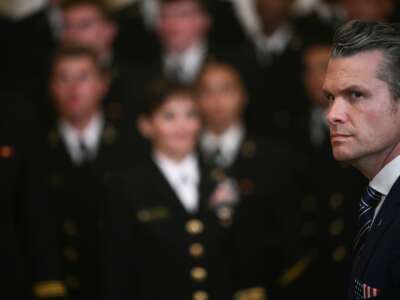 Defense Secretary Pete Hegseth attends a ceremony to present the Commander-in-Chief's Trophy to the U.S. Naval Academy football team in the East Room of the White House on April 15, 2025, in Washington, D.C.