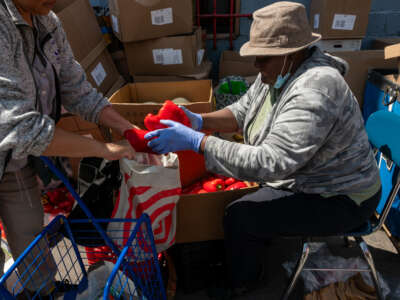 Residents participate in a twice-weekly food distribution at a church in the South Bronx on April 23, 2025, in New York City.