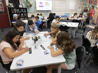 Students get to work on the first day of school in Hannah Jones' 5/6 combo class at Trabuco Mesa Elementary School in Rancho Santa Margarita, California, on August 13, 2025.
