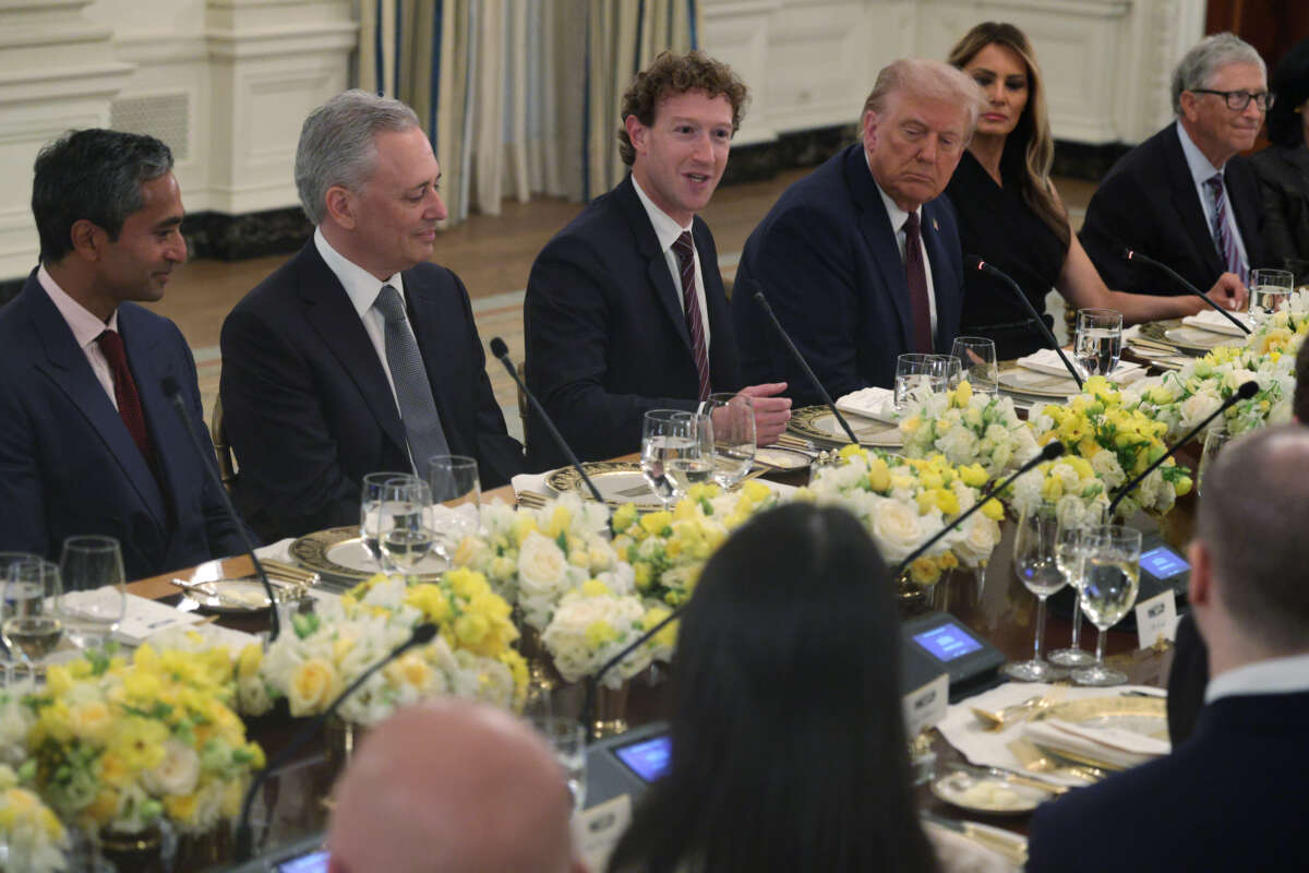 Meta CEO Mark Zuckerberg speaks as CEO of Social Capital Chamath Palihapitiya, White House “AI and Crypto Czar” David Scahs, U.S. President Donald Trump, first lady Melania Trump and Microsoft Co-Founder Bill Gates listen during a dinner at the State Dining Room of the White House on September 4, 2025, in Washington, D.C.