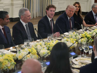 Meta CEO Mark Zuckerberg speaks as CEO of Social Capital Chamath Palihapitiya, White House “AI and Crypto Czar” David Scahs, U.S. President Donald Trump, first lady Melania Trump and Microsoft Co-Founder Bill Gates listen during a dinner at the State Dining Room of the White House on September 4, 2025, in Washington, D.C.