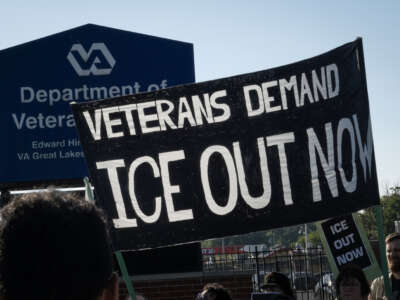 A small group of veterans, healthcare workers and supporters, gather outside the Edward Hines, Jr. VA Hospital in protest of Immigration and Customs Enforcement (ICE), who are using part of the facility to facilitate Operation Midway Blitz, on September 15, 2025, in Hines, Illinois.