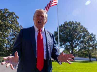 U.S. President Donald Trump talks to the media before heading to Marine One on the south lawn of the White House on October 5, 2025, in Washington, D.C.
