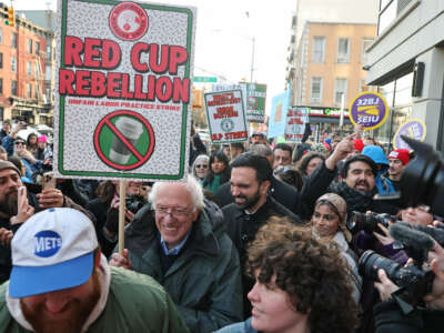 New York City Mayor-elect Zohran Mamdani (R) and U.S .Senator Bernie Sanders join striking Starbucks workers in New York City, on December 1, 2025.