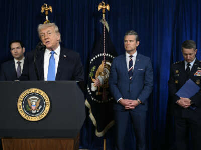 President Donald Trump, alongside Secretary of State Marco Rubio, Secretary of Defense Pete Hegseth, and Chairman of the Joint Chiefs of Staff General Dan Caine, speaks to the press following US military actions in Venezuela, at his Mar-a-Lago residence in Palm Beach, Florida, on January 3, 2026.