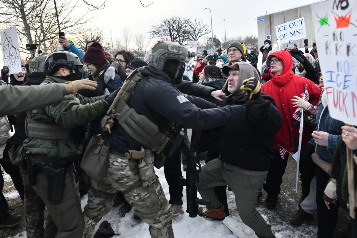 Federal agents clash with protesters outside the Bishop Henry Whipple Federal Building in Saint Paul, Minnesota, on January 8, 2026 following the ICE-perpetrated killing of Renee Nicole Good in Minneapolis on January 7.